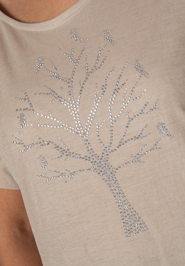 Kremowa bluzka XXL ze srebrnym motywem