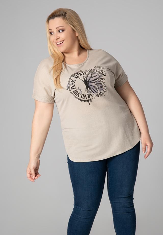 Kremowa bluzka plus size z oryginalnym motywem