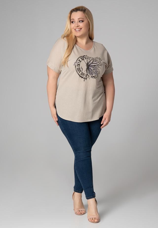 Kremowa bluzka plus size z oryginalnym motywem